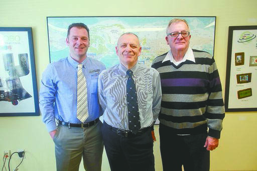 COBO INTERNATIONAL PLANT MANAGER MASSIMILIANO RUZZI, CEO GINO MAINARDI AND HUMAN RESOURCES AND ACCOUNTING MANAGER RANDY STANBARY ARE SHOWN IN THE CONFERENCE ROOM WEDNESDAY AT THE BURLINGTON PLANT